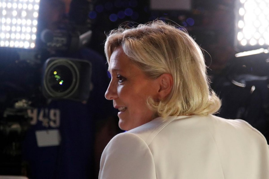 French far-right National Rally (Rassemblement National) party leader Marine Le Pen talks to the media after the first results in Paris, France, May 26, 2019. Reuters