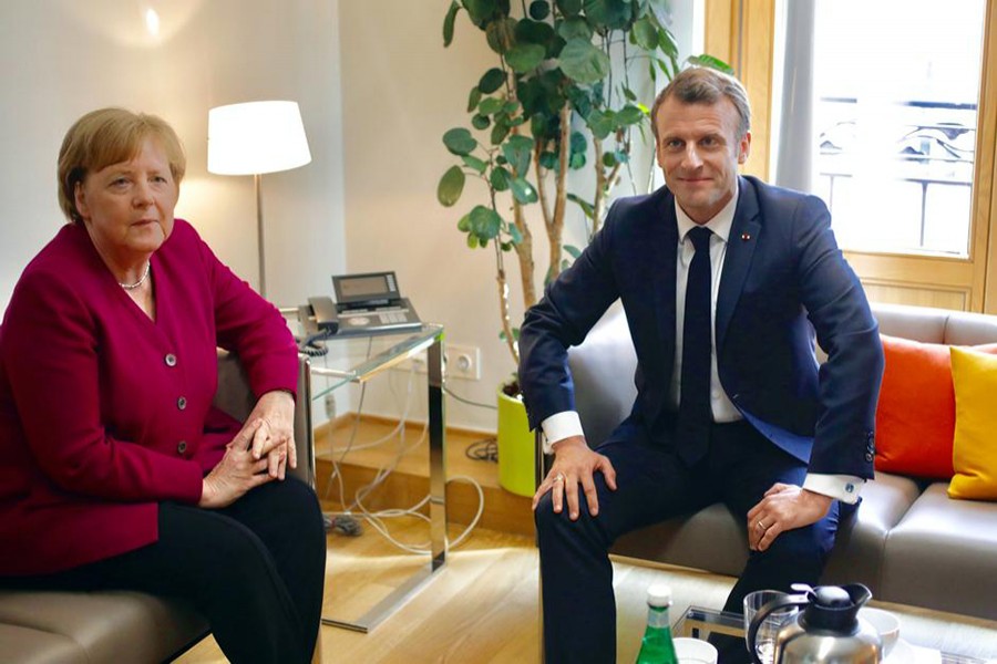 German Chancellor Angela Merkel meets with French President Emmanuel Macron on the sidelines of a European Union leaders summit after European Parliament elections to discuss who should run the EU executive for the next five years, in Brussels, Belgium on May 28, 2019 — Reuters photo