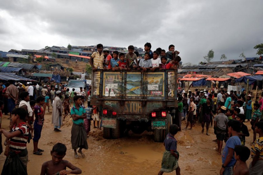 Rohingya refugee children gather on a truck in Cox's Bazar, Bangladesh, September 28, 2017. Reuters/Files