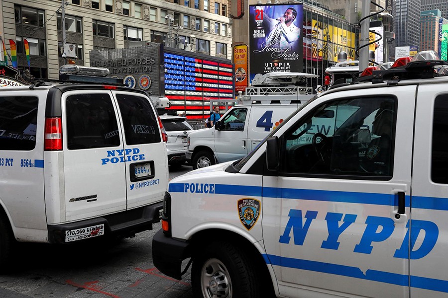 New York City Police Department (NYPD) vehicles patrol in Time Square after a man was arrested in an alleged plot to buy grenades for an attack on Times Square in New York, US on Firday — Reuters photo