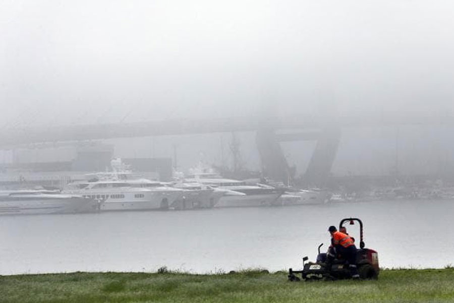 Fog pictured over Anzac Bridge in Sydney, making it appear to have ‘disappeared’ - Picture: Richard Dobson/ News Corp Australia