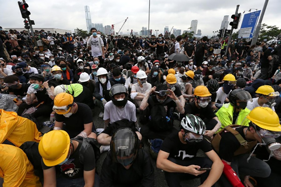 Protesters occupy a road as they demonstrate against a proposed extradition bill in Hong Kong, China on June 12, 2019 — Reuters photo