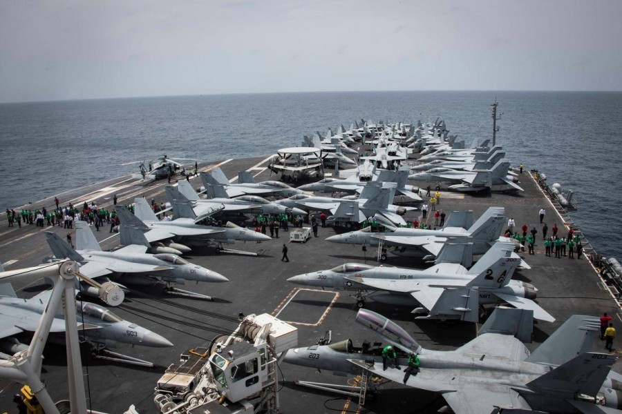 Flight deck of the US aircraft carrier USS Abraham Lincoln (CVN 72) is seen as sailors swip the deck for foreign object and debris (FOD) walk-down on the flight deck of the Nimitz-class aircraft carrier USS Abraham Lincoln (CVN 72) in Arabian Sea, May 19, 2019 - Garrett LaBarge/US Navy/Handout via REUTERS
