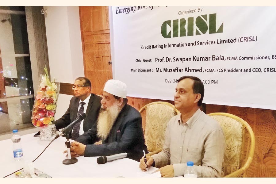 Muzaffar Ahmed , CEO, CRISL, addressing the seminar while Prof Dr. Swapan Kumar Bala (extreme right), Commissioner, BSEC, and Md. Asaduzzaman Khan (Extreme left), Executive Director, CRISL seen