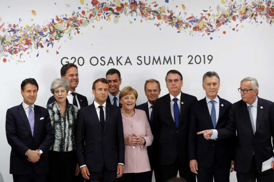 Leaders pose for a picture during the G20 summit in Osaka, Japan, June 29, 2019. Reuters