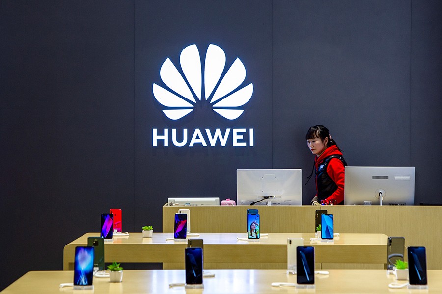 A staff member is seen inside a Huawei retail store in Shanghai, China on May 8, 2019 — Reuters/Files
