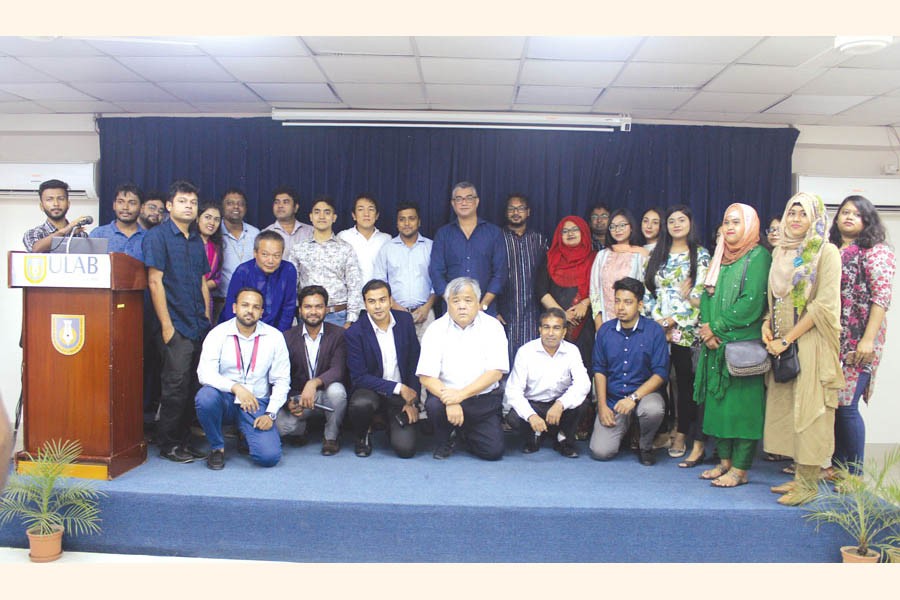 Organisers, guests and some participants posing for a photo at a seminar on Initiate Your Career in Japan: Hands-on Introduction held at ULAB, Dhaka