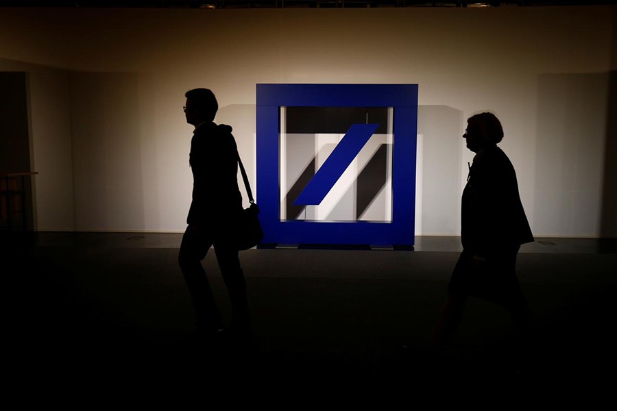 The logo of Deutsche Bank is seen at its headquarters ahead of the bank's annual general meeting in Frankfurt, Germany on May 18, 2017 — Reuters/Files