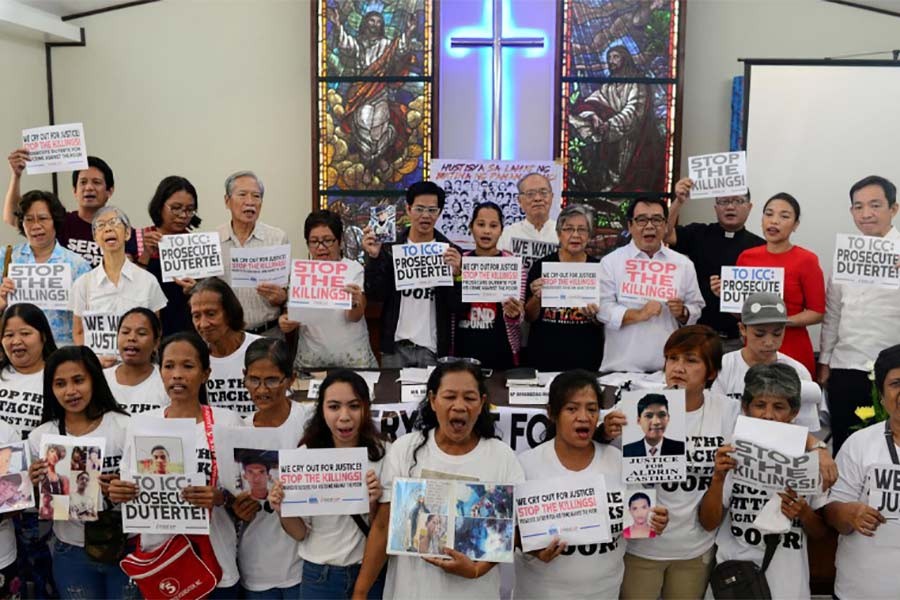 Activists and families of drug war victims displaying placards during a protest against the war on drugs by President Rodrigo Duterte in Quezon city, Metro Manila in Philippines in 2018. -Reuters Photo