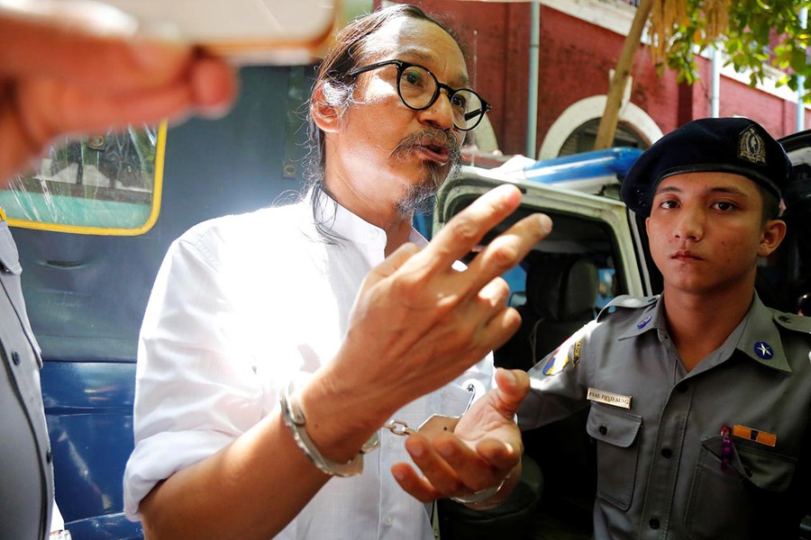 Filmmaker Min Htin Ko Ko Gyi talks to media at Insein court in Yangon, Myanmar on July 18, 2019 — Reuters photo