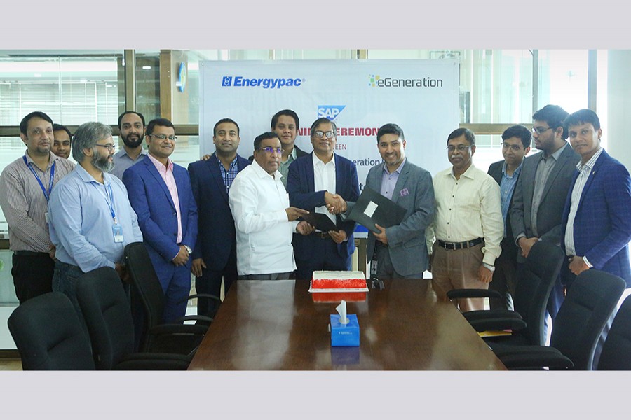 Humayun Rashid, Managing Director and CEO of Energypac Power Generation Ltd (centre-left), and Shameem Ahsan, Chairman of eGneneration Group, shaking hands after signing an agreement on behalf of their respective organisations recently