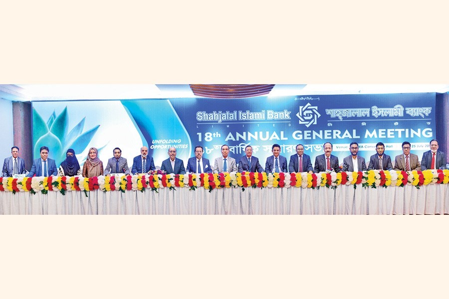 Chairman of Shahjalal Islami Bank Limited (SIBL) Akkas Uddin Mollah presiding over the 18th AGM of the bank in the city on Thursday. Among others, Managing Director & CEO M Shahidul Islam was present