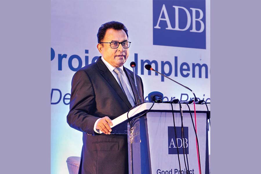 AHM Mustafa Kamal speaking at the ADB programme — PID