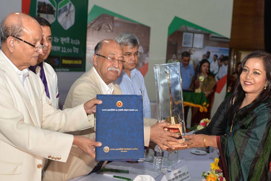 Industries minister Nurul Majid Mahmud Humayun  (third from left) handed over “National Productivity and Quality Excellent Award-2018” at the Institution of Diploma Engineers, Bangladesh (IDEB) auditorium in the city today (Sunday). State minister for industries Kamal Ahmed Mojumder (first from left), among others, was also present -- PID photo