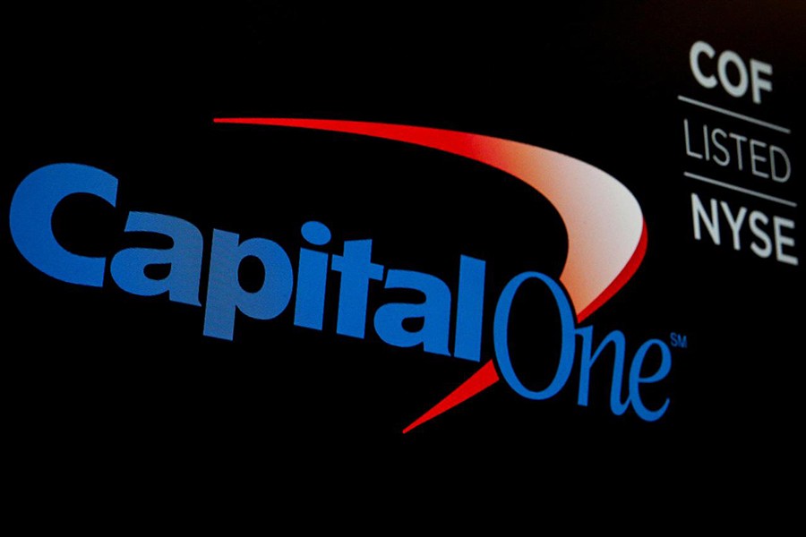 The logo and ticker for Capital One are displayed on a screen on the floor of the New York Stock Exchange (NYSE) in New York, US on May 21, 2018 — Reuters/Files