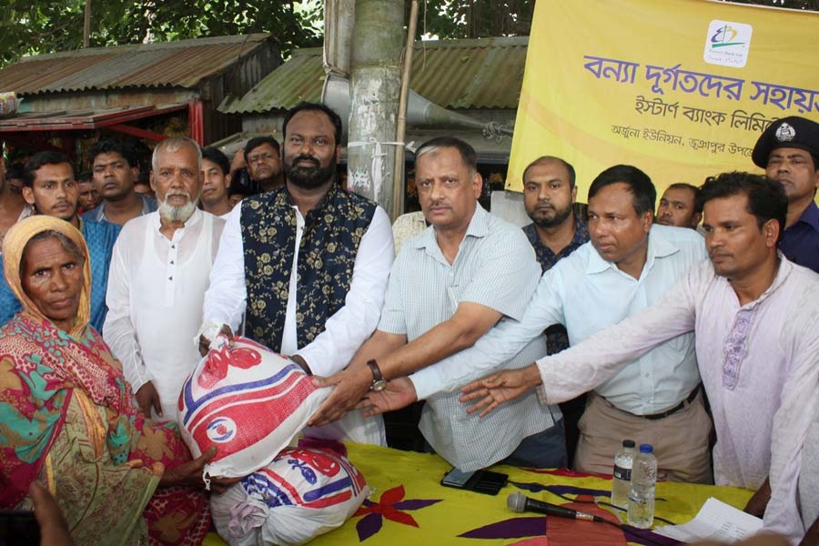 EBL gives relief goods to flood victims in Tangail