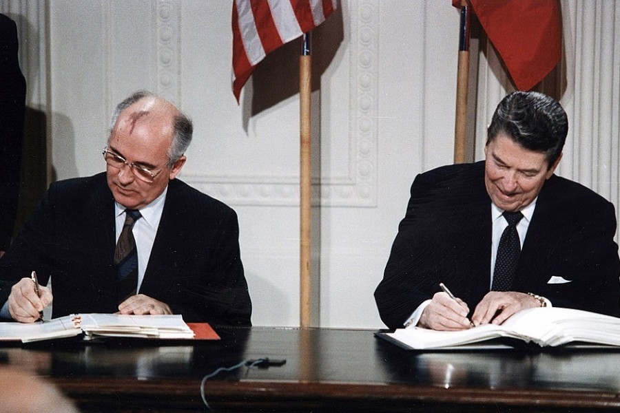 US President Ronald Reagan (R) and Soviet President Mikhail Gorbachev sign the Intermediate-Range Nuclear Forces (INF) treaty in the White House December 8 1987. - REUTERS