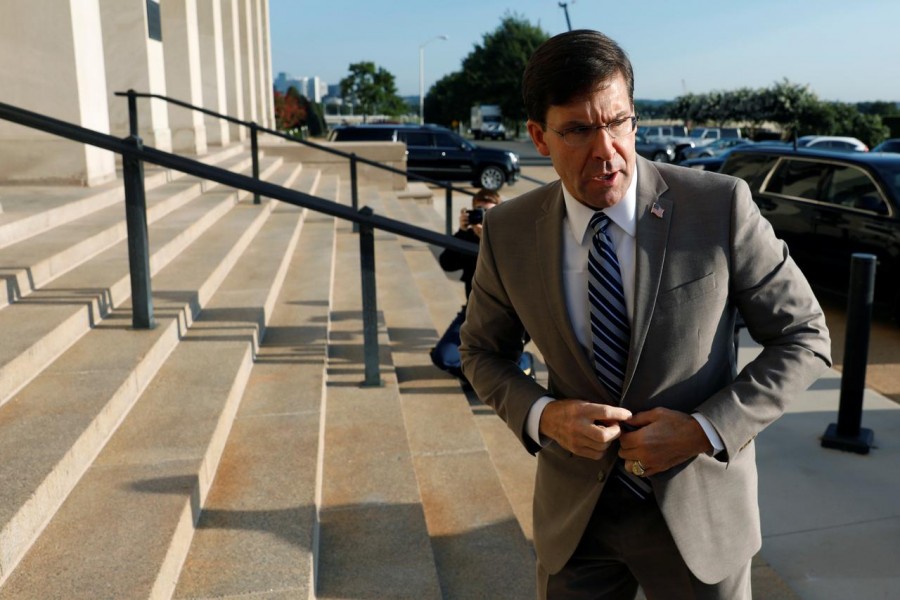 Mark Esper talks to reporters as he arrives at the Pentagon in Arlington, Virginia, US, July 24, 2019. Reuters/Files