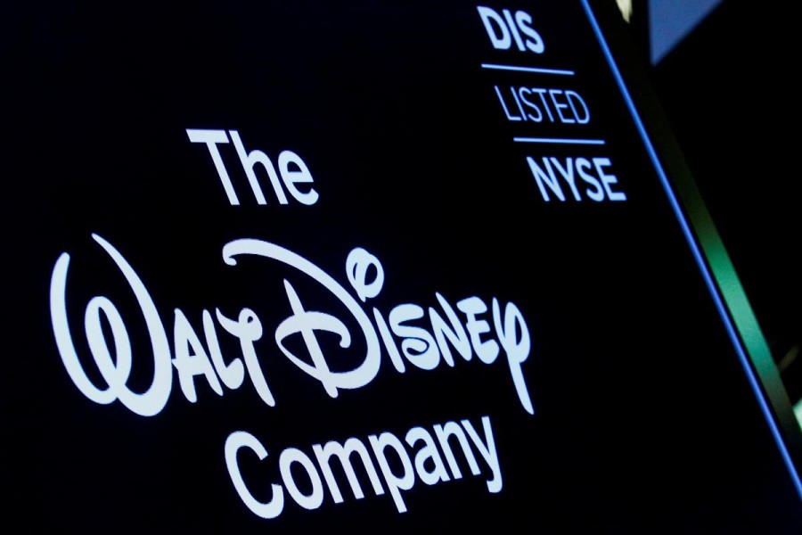 A screen shows the logo and a ticker symbol for the Walt Disney Company on the floor of the New York Stock Exchange (NYSE) in New York, US, December 14, 2017 - REUTERS/Brendan McDermid/File Photo