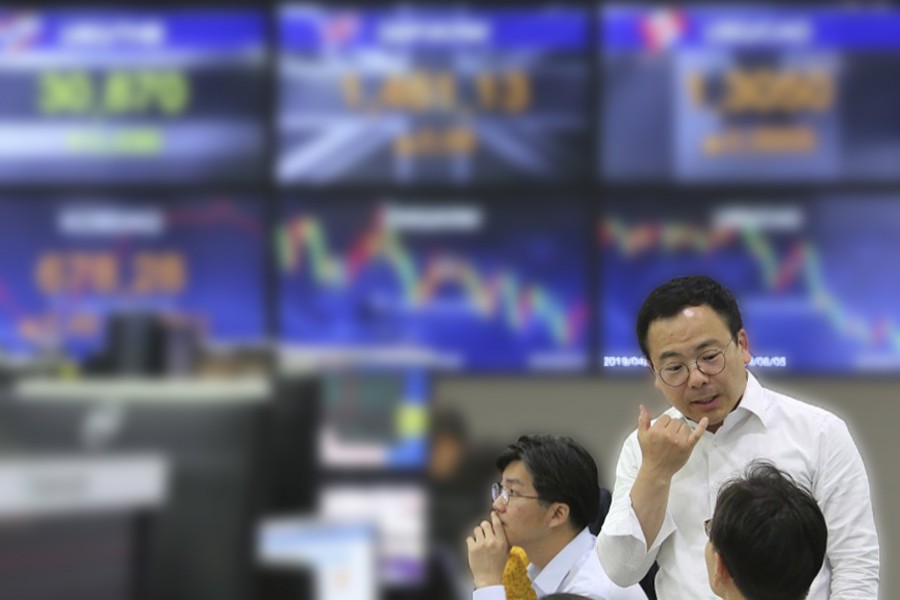 Asian shares rebound after volatile Wall Street day