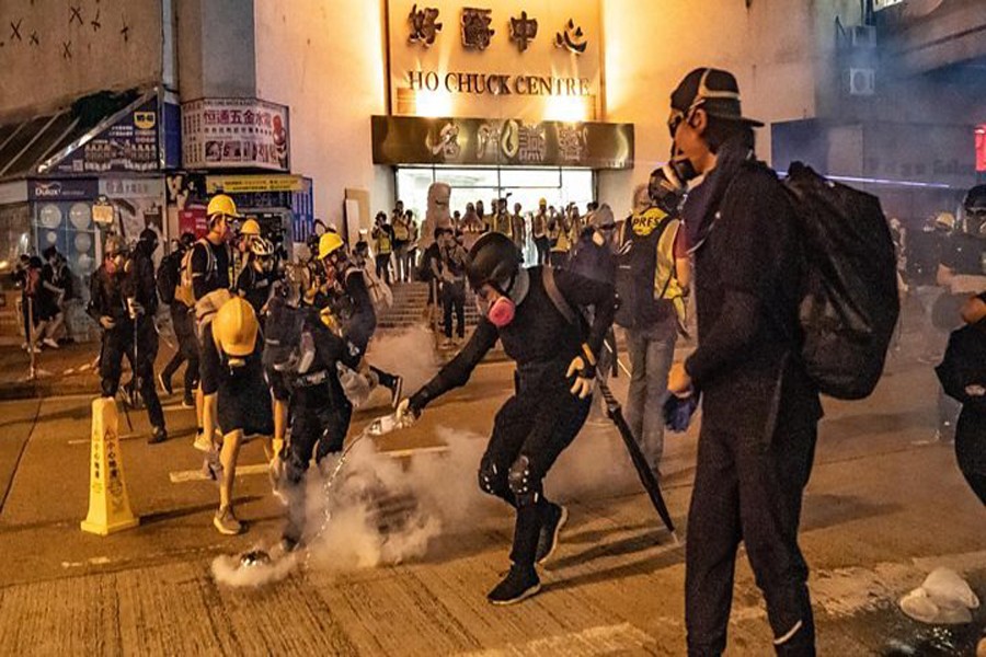 HK protests: Clashes as police fire tear gas into rail station