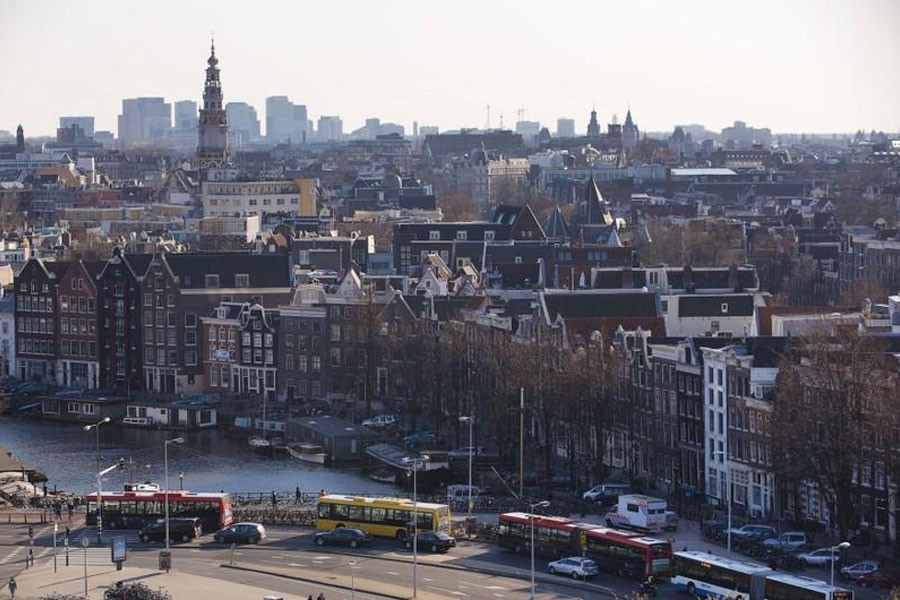 FILE PHOTO - A rootop view of Amsterdam from SkyLounge on the 11th floor of the DoubleTree by Hilton Hotel in Amsterdam April 2, 2013. REUTERS/Michael Kooren
