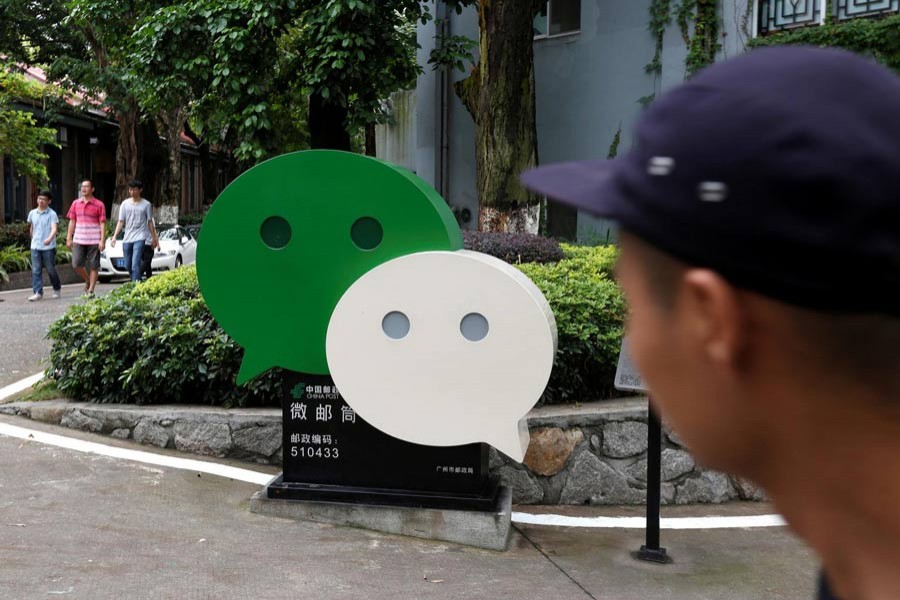 A file photo showing a WeChat logo is displayed inside TIT Creativity Industry Zone, where a Tencent office is located in Guangzhou, China 	— Reuters