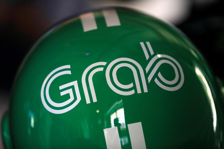 A Grab motorbike helmet is displayed during Grab's fifth anniversary news conference in Singapore on June 6, 2017 — Reuters/Files