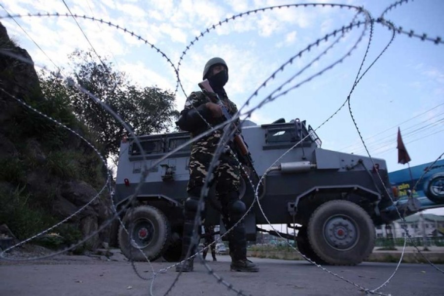 An Indian security personnel stands guard on a deserted road during restrictions after scrapping of the special constitutional status for Kashmir by the Indian government, in Srinagar, Aug 23, 2019. REUTERS