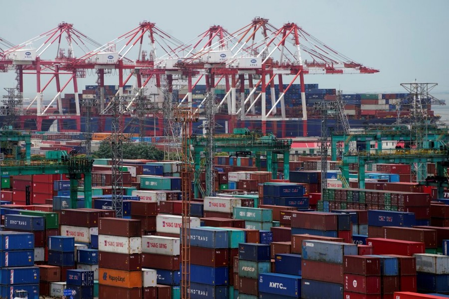 FILE PHOTO: Shipping containers are seen at a port in Shanghai, China July 10, 2018. REUTERS/Aly Song/File Photo