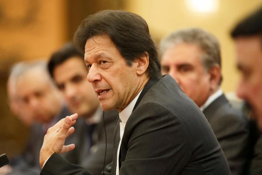 FILE PHOTO: Pakistani Prime Minister Imran Khan attends talks at the Great Hall of the People in Beijing, November 2, 2018. REUTERS/Thomas Peter/Pool/File Photo