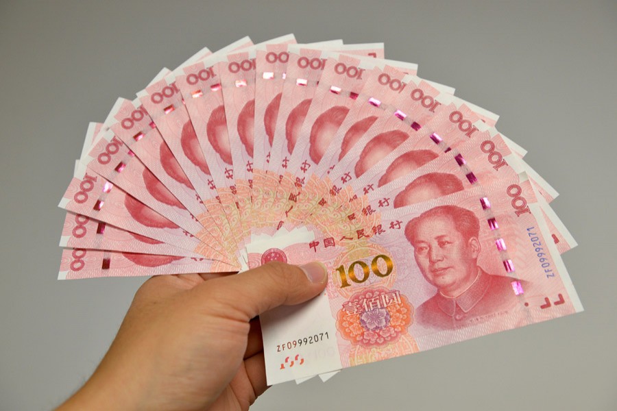 China cuts financial institutions' reserve ratios to boost lending