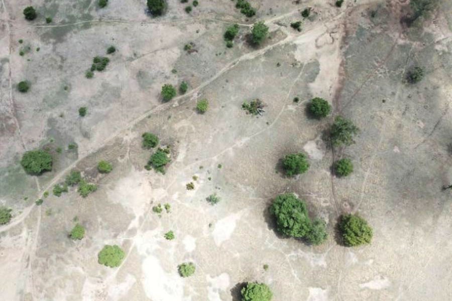 Forest fires, droughts and other forms of land degradation cost the global economy as much as US$15 trillion every year and are deepening the climate change crisis. Pictured is a drone visual of an area in Upper East Region, Ghana prior to restoration taken in 2015.            —Credit: Albert Oppong-Ansah /IPS