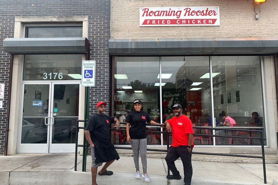 The three owners of Roaming Rooster, a D.C. restaurant whose fried chicken sandwiches exploded in popularity after a viral tweet. From left, Biniyam Habtemariam, his wife, Hareg Mesfin, and his brother Michael Habtemariam - Solomon Photo and Video Production