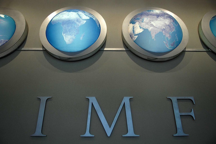 The IMF nameplate is displayed on a wall at the headquarters during the World Bank/International Monetary Fund Spring Meetings in Washington on April 11, 2008 — Reuters/Files