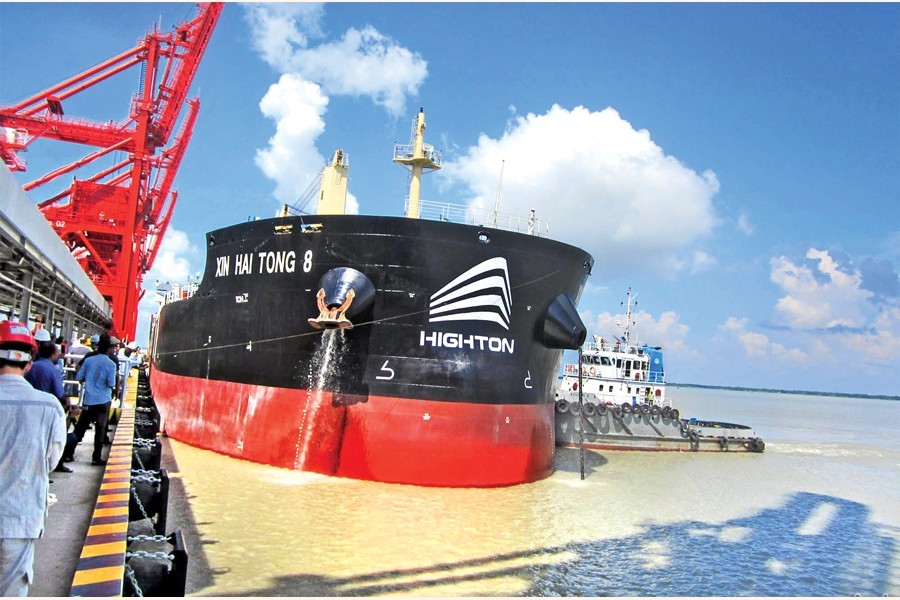 A vessel carrying the first consignment of coal for the 1320MW Payra Thermal Power Plant docked at the plant terminal in Patuakhali on Thursday — Focus Bangla