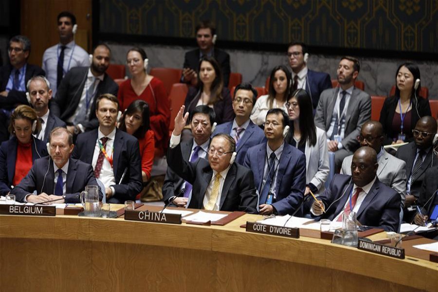 China's Permanent Representative to the United Nations Zhang Jun (C, Front) vetoes a UN Security Council draft resolution on Syria at the UN headquarters in New York, on September, 19, 2019. Xinhua