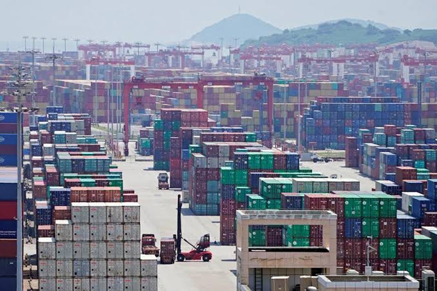 Containers are seen at the Yangshan Deep Water Port in Shanghai, China August 6, 2019. Reuters/Files