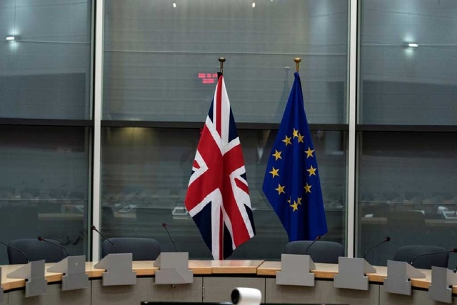 British Union Jack and EU flags are pictured before the meeting with Britain's Brexit Secretary Stephen Barclay and European Union's chief Brexit negotiator Michel Barnier at the EU Commission headquarters in Brussels, Belgium, September 20, 2019. Reuters