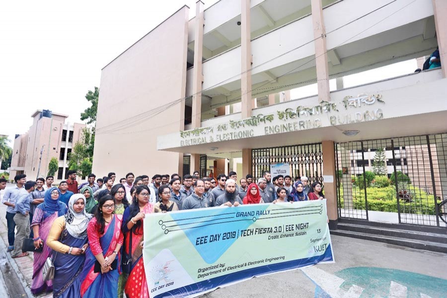 Teachers, students and alumni of the Department of Electrical and Electronic Engineering (EEE), Khulna University of Engineering and Technology, taking part in a rally on EEE Day 2019