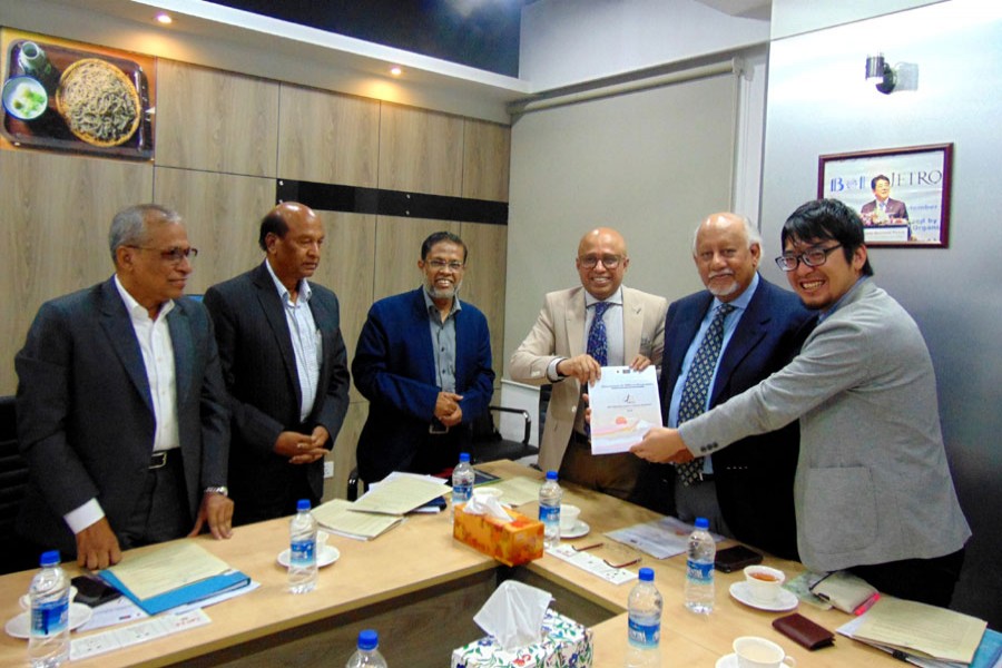 Officials of Japan Bangladesh Chamber of Commerce and Industry (JBCCI) unveiling a report on development of SMEs in Bangladesh at Japan External Trade Organization (JETRO) office in the city on Sunday