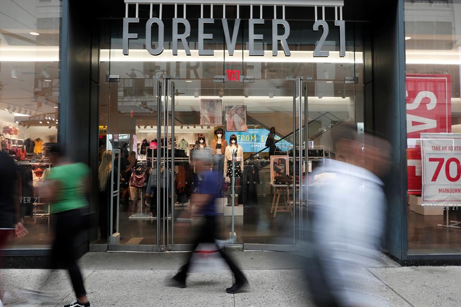 People walk by the clothing retailer Forever 21 in New York City, US on September 12, 2019 — Reuters/Files