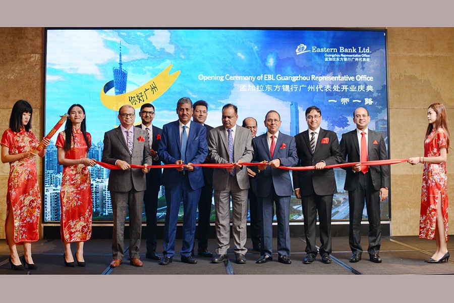 AHM Jahangir, economic counsellor of Bangladesh Embassy to China, Md Showkat Ali Chowdhury, chairman, Meah Mohammed Abdur Rahim, director, Ali Reza Iftekhar, managing director and CEO of EBL seen cutting a ribbon to formally inaugurate the China operations of the bank