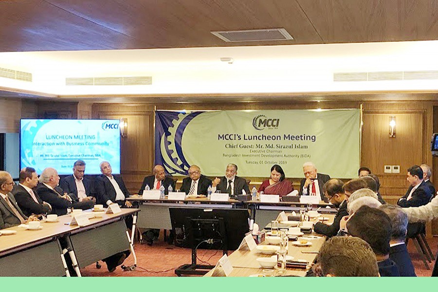 Executive Chairman of Bangladesh Investment Development Authority (BIDA) Md Sirazul Islam speaking as chief guest at a luncheon meeting organised by Metropolitan Chamber of Commerce and Industry, Dhaka (MCCI) at its Gulshan office premises on Tuesday. On his left is MCCI president Nihad Kabir and next is Apex Group Chairman Syed Monzur Elahi