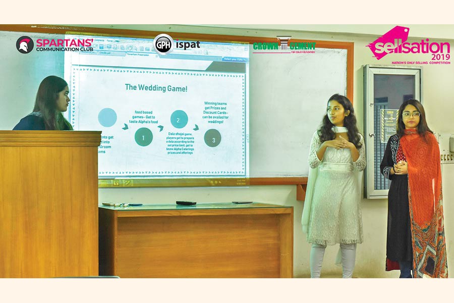 Participants presenting their cases in front of the judges in the  on-spot round of Sellsation 2019 held at Dhaka University