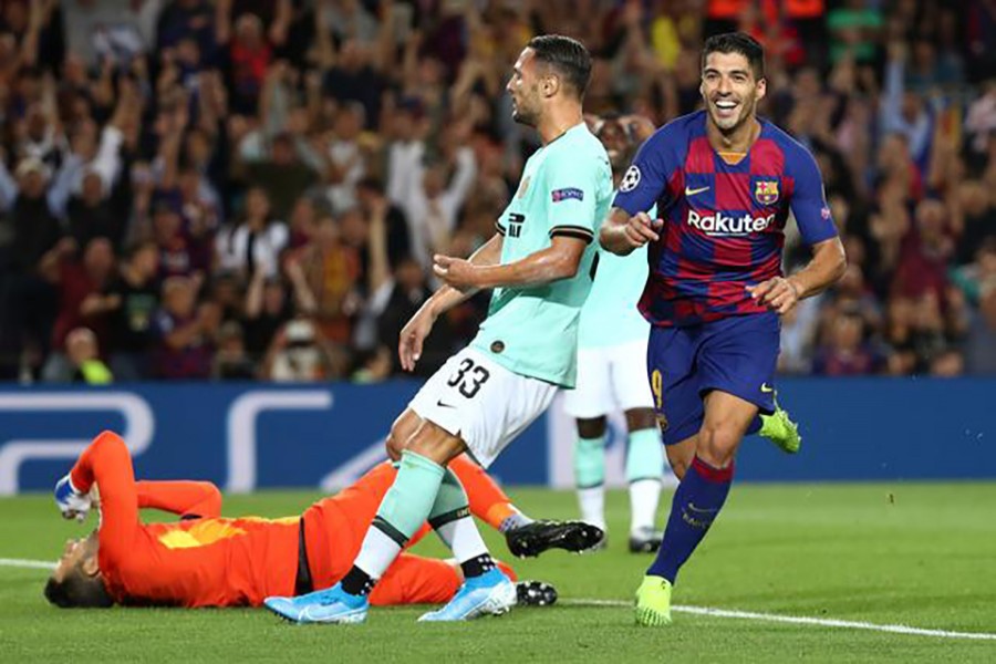 Barcelona's Luis Suarez celebrates scoring their second goal — Reuters photo