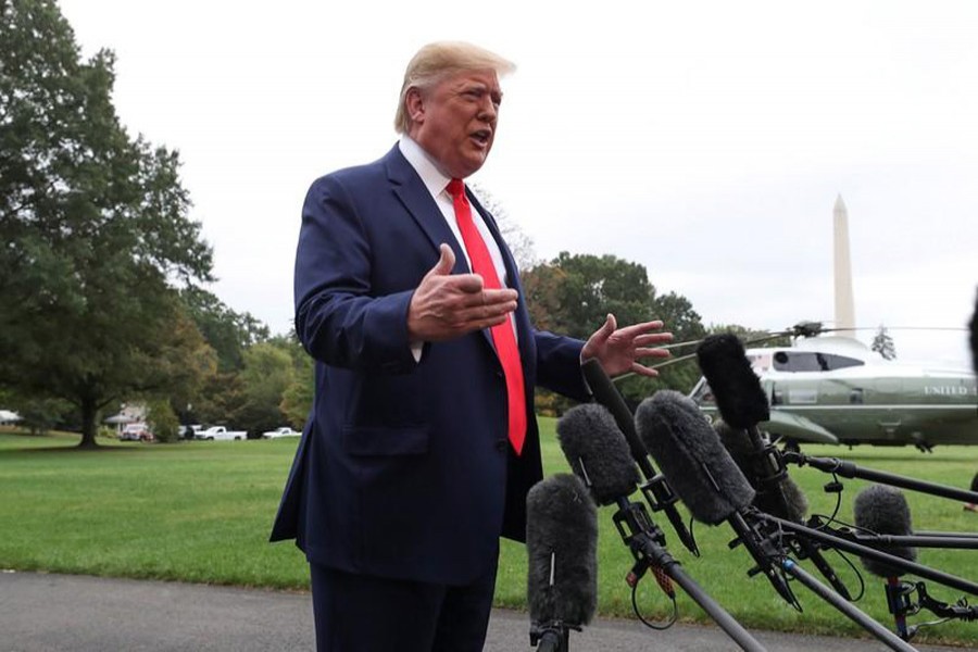 US President Donald Trump talks to reporters as he departs for travel to Florida from the South Lawn of the White House in Washington, US, October 3, 2019. Reuters
