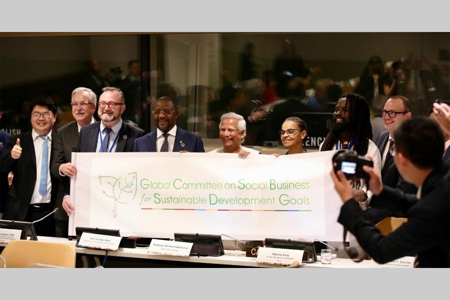 Nobel Laureate Professor Muhammad Yunus launching the new logo of Global Committee on Social Business for Sustainable Development Goals with fellow VIP members of the committee
