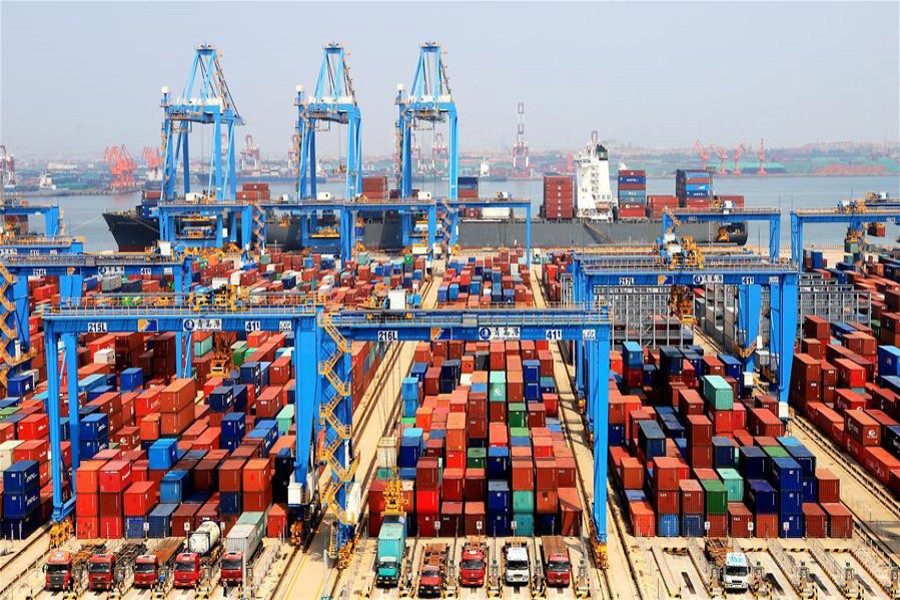 Photo taken on May 16, 2018 shows an automatic container dock in Qingdao, east China's Shandong Province -- Xinhua