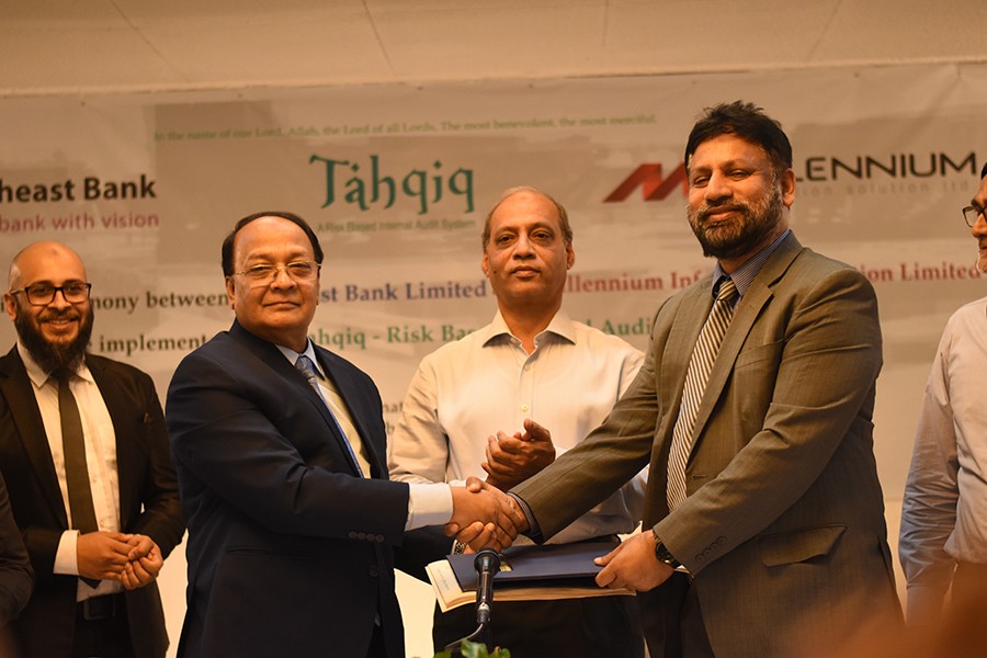 Mr. Mahmud Hossain, Managing Director of MISL and Mr. M. Kamal Hossain, Managing Director of SEBL exchanging documents in the ceremony.